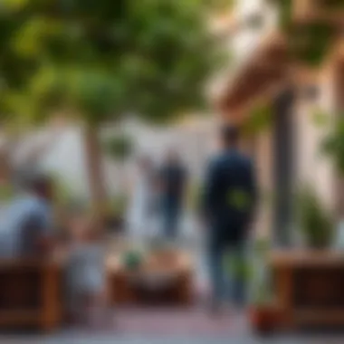 A vibrant community space in واحه العين filled with families and greenery